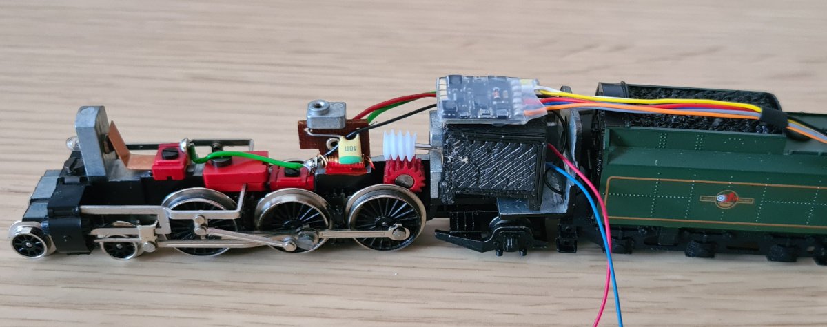 The wire routing is messy with the decoder on top of the motor, and it potentially blocks the body shell from being fitted.