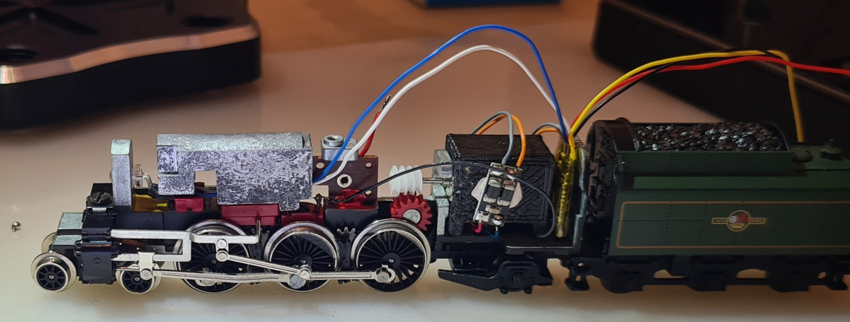 Fitting underway. The motor filter is temporarily held in place by white tack here, which was later replaced with “black tack” putty.